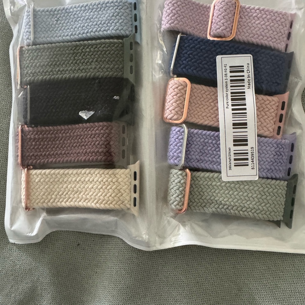 New in Plastic 10 Smartwatch bands in different colors. Fits watches 40/41